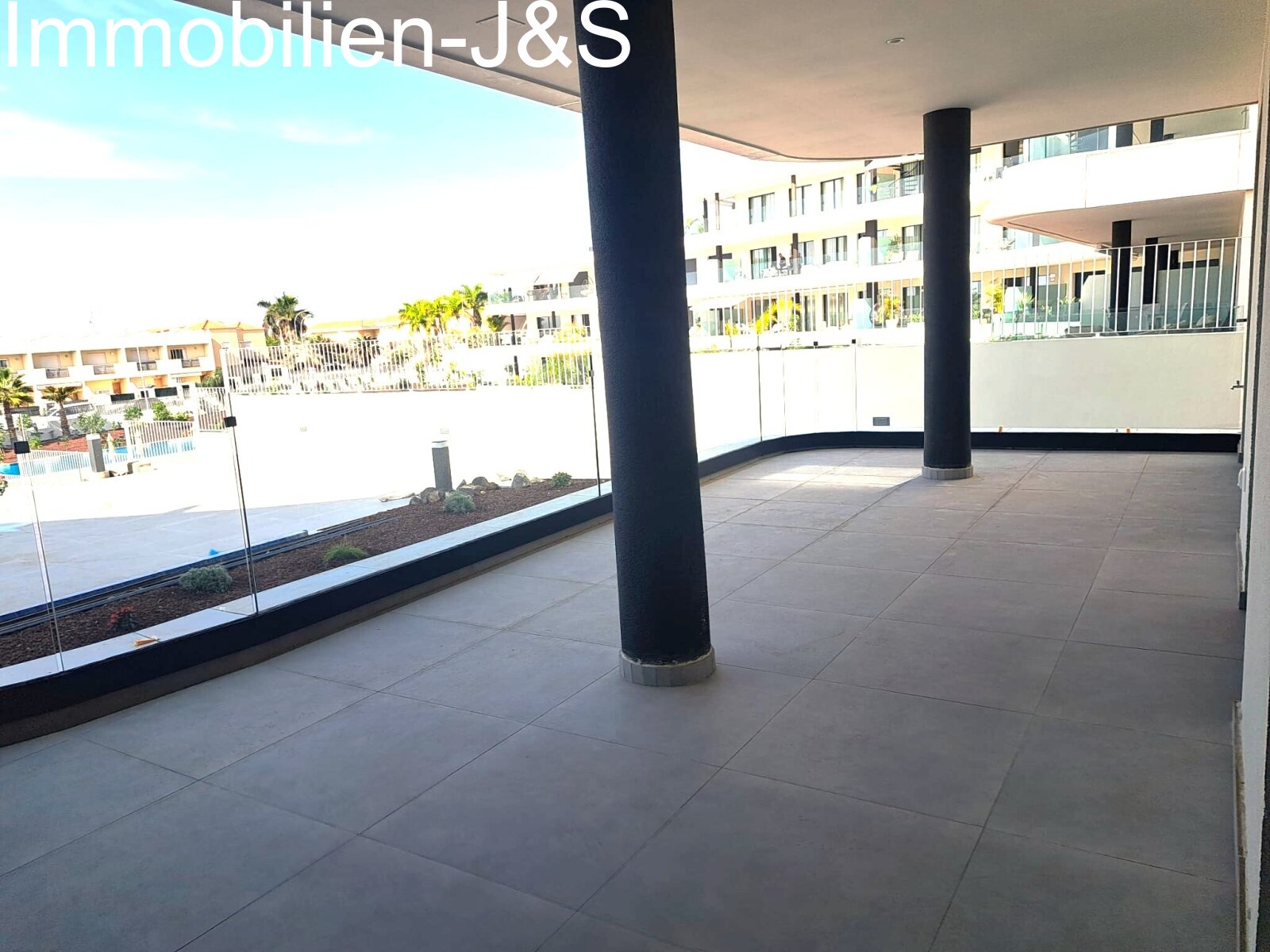 New corner apartment with pool views and afternoon sun in "Atlantic Homes"