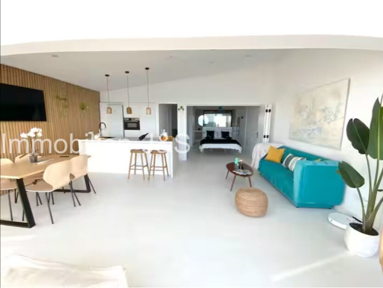 Open living / dining / kitchen area, rear view