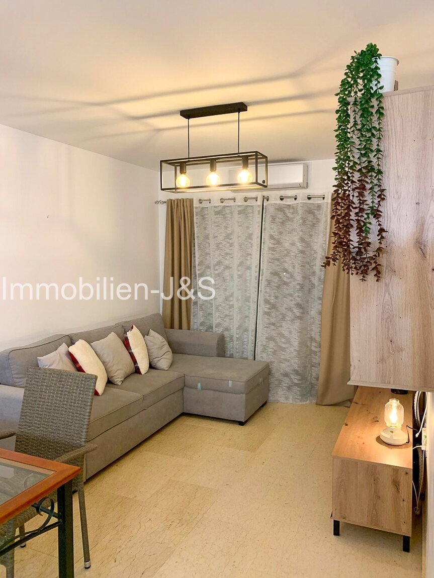 Vivienda soleada rodeada de naturaleza: elegante apartamento con vistas a la piscina en el cotizado Risco del Oro
